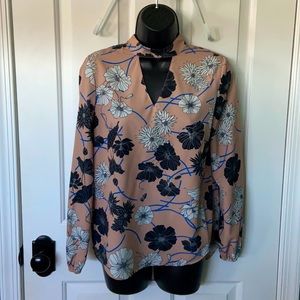 Unique pink blouse with floral print and cut outs